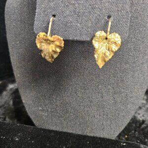 Gold tone leaf shape dangle earrings